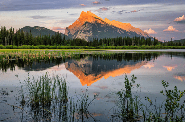 Mount Rundle and Vermillion Lakes from the "Rundel Reflections" puzzle. Image features snow-capped peaks, serene lakes, and vibrant foliage in Banff National Park.