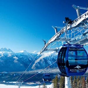 Revelstoke Mountain Gondola with mountain view behind