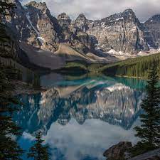 Rugged mountain landscape with lake in the foreground